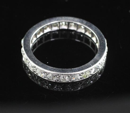 A white gold and diamond full eternity ring, size O.